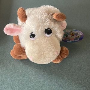 Adorable cuddly crooners singing goat battery operated hand puppet.